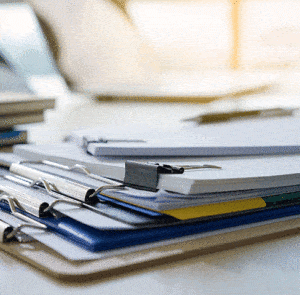 paperwork in clipboards