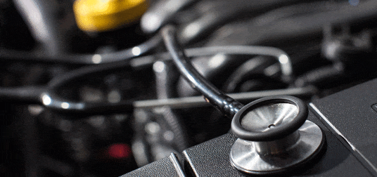 photo of stethoscope on car engine for Competition and Compliance article