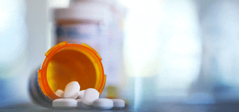 bottle of prescription pills for new drug commercialization article
