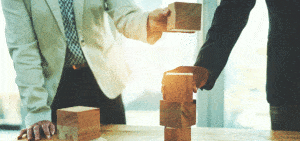 People stacking blocks for project portfolio management article