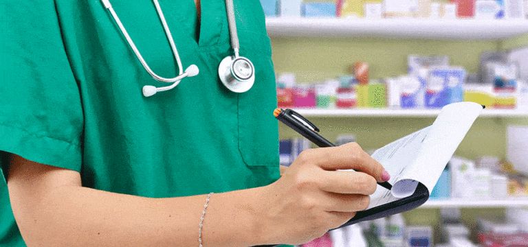 photo of healthcare professional filling out paperwork on clipboard for prescription for product safety article