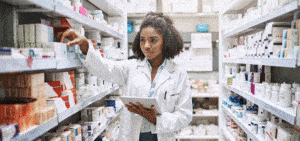 pharmacist checking inventory