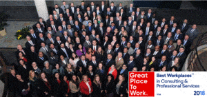 IPM employees with Great Place to Work 2018 logo