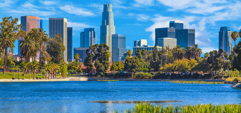 Los Angeles buildings in the background with a lake in the front