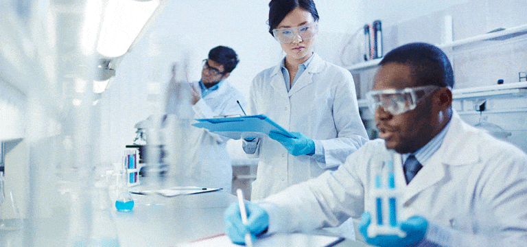 photo of three people working in a lab for change management regulatory affairs group case study