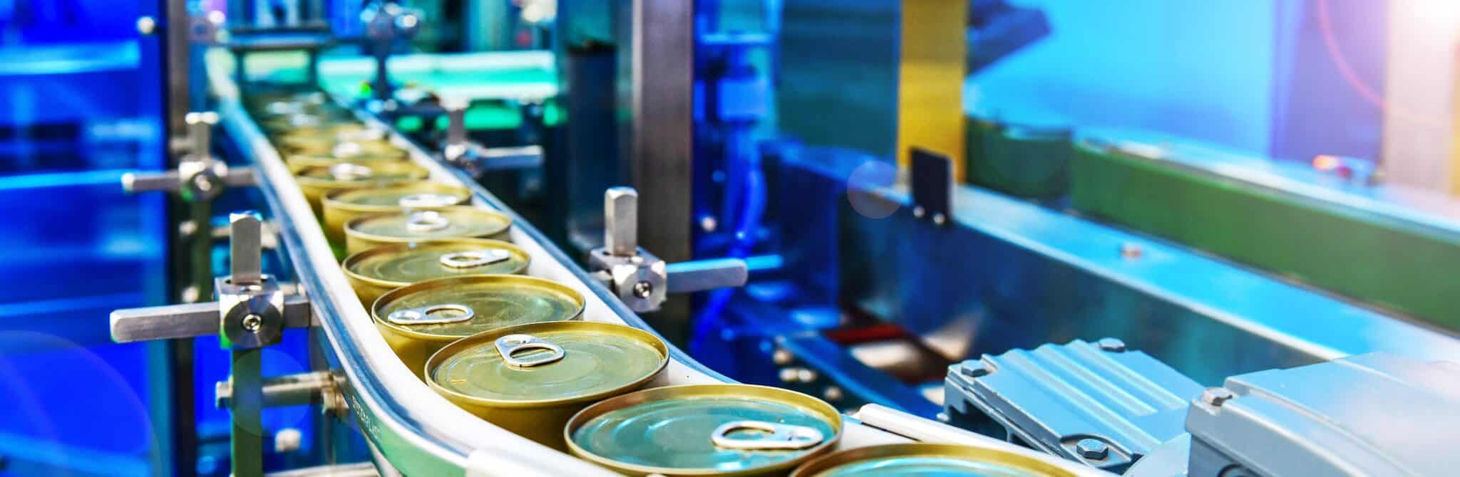 aluminum cans on a production line at a manufacturing facility