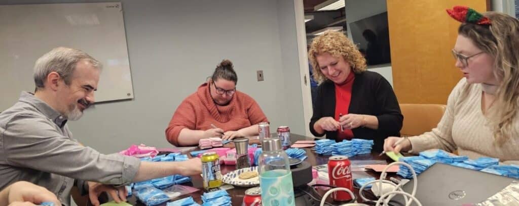 Packing health products for underprivileged women