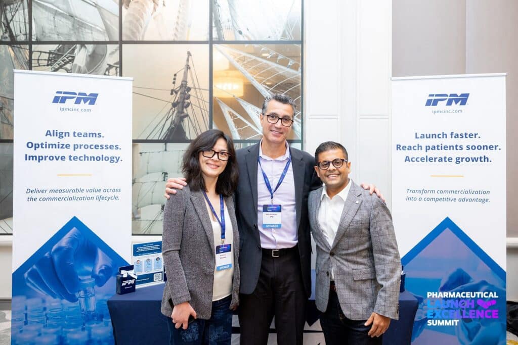 IPM at PHLEX 2026 - Harry Georgiades and panel members at booth